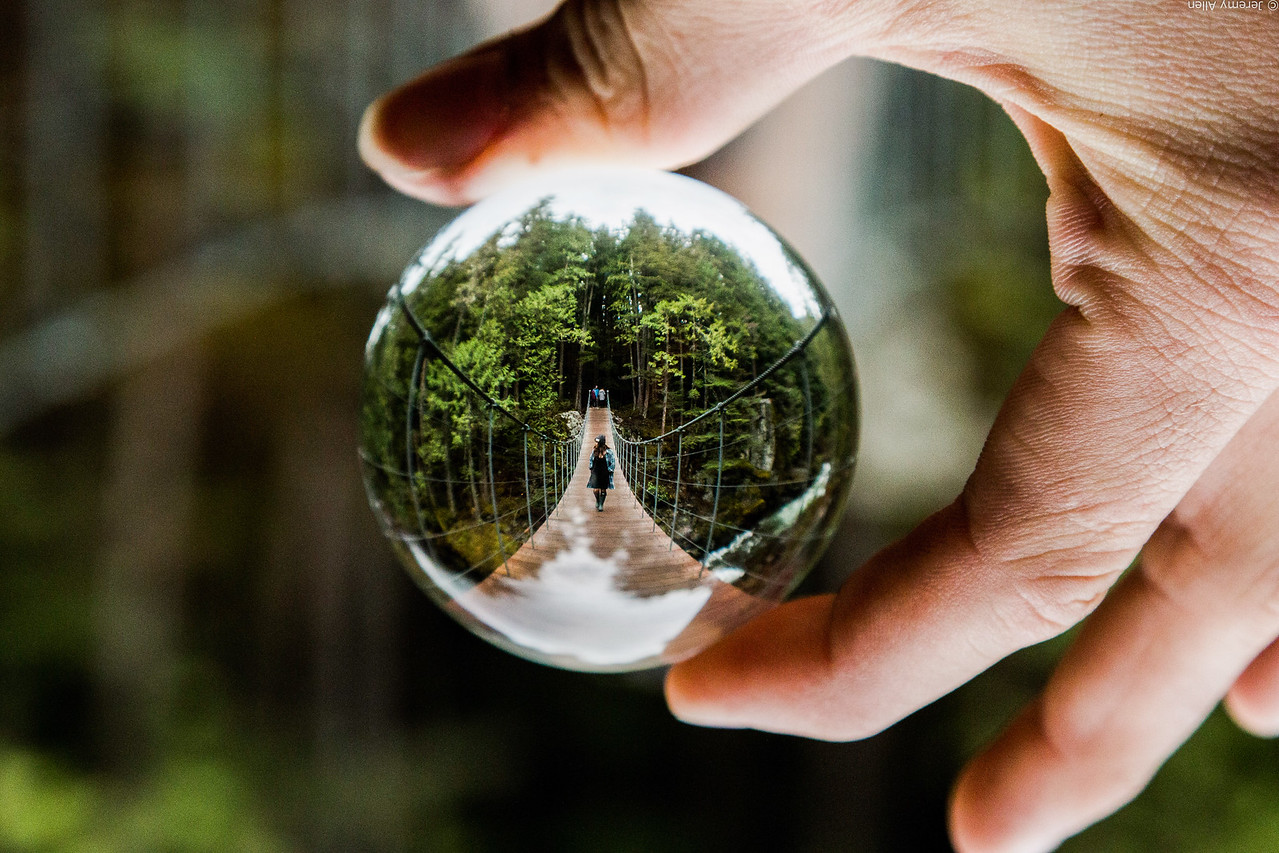 Crystal lensball reflecting Whistler mountain landscape upside down